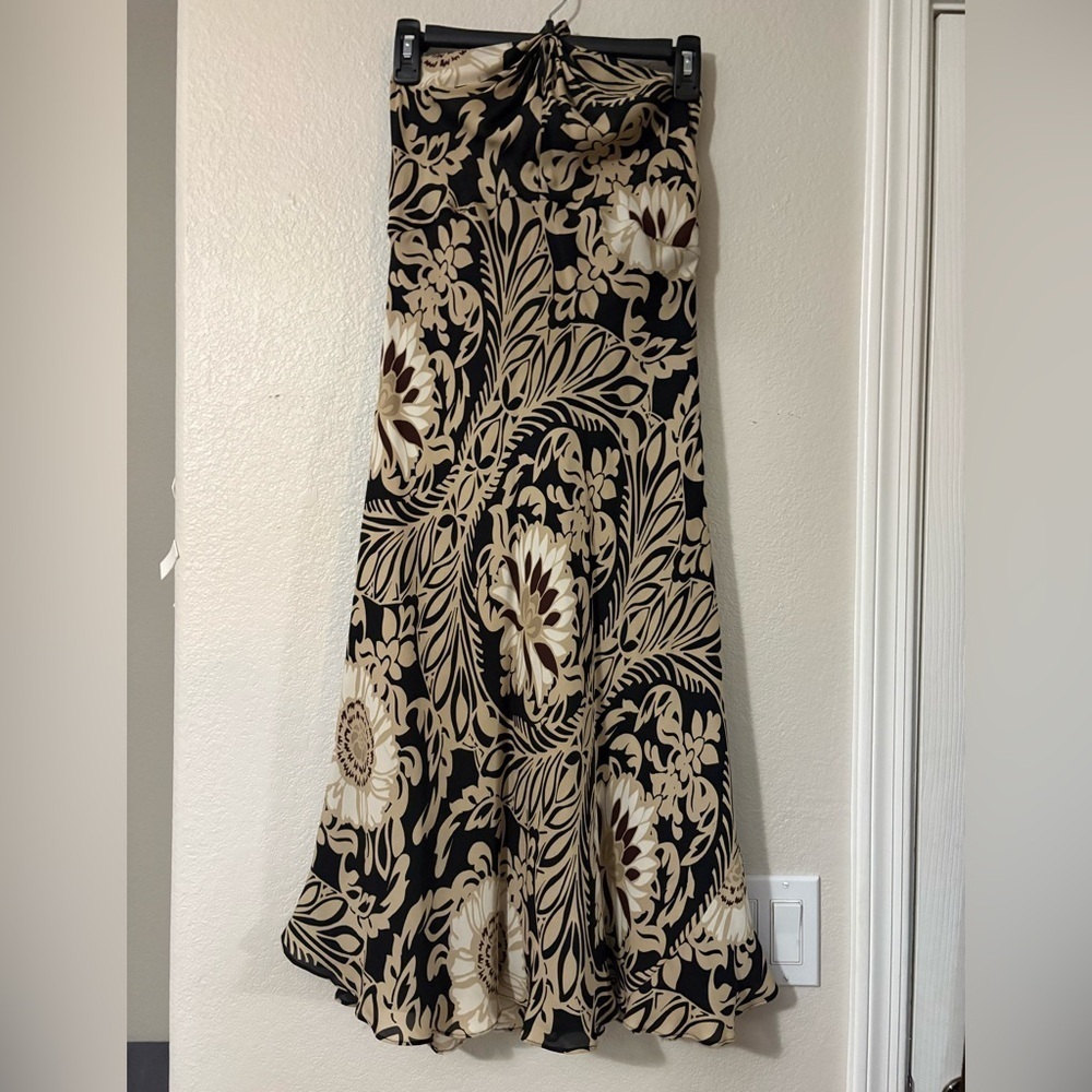 Beautiful 100% silk halter neck printed dress. Black, tan and cream color.